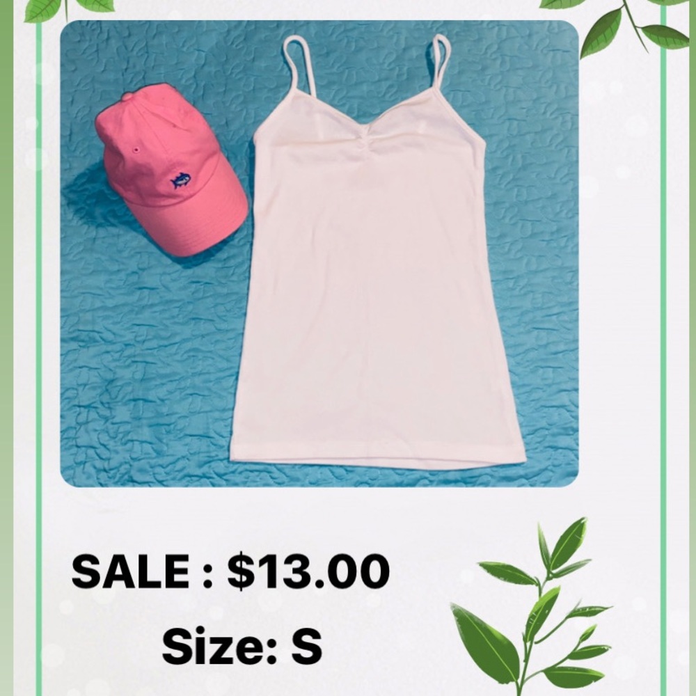 White shirt and pink cap